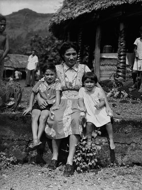 [Portrait of a woman and two children]