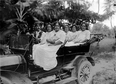 Motorcar with five passengers and a driver