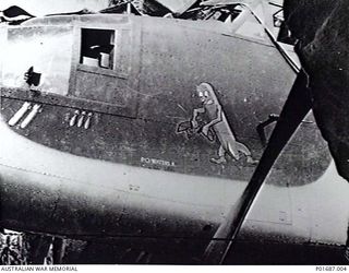 MILNE BAY, PAPUA, 1943-05. NOSE SECTION OF BRISTOL BEAUFORT BOMBER NO. A9-193 OF NO. 100 SQUADRON RAAF AT GURNEY AIRFIELD. PAINTED ON THE NOSE IS A CARTOON OF A TORPEDO BREAKING A JAPANESE SHIP IN ..