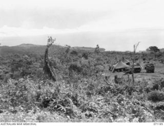 FINSCHHAFEN AREA, NEW GUINEA, 1944-03-17. LOOKING NORTH NORTH EAST FROM CEMETERY CORNER TOWARDS PINO HILL TO THE LEFT AND SCARLET BEACH ON THE RIGHT