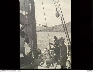 PORT MORESBY, PAPUA. C. 1944. CREW ABOARD A SAILING VESSEL, PROBABLY THE AITARA, USED BY THE RAAF RESCUE SERVICE