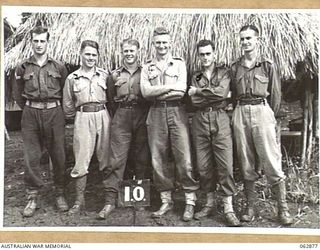 RAMU VALLEY, NEW GUINEA. 1944-01-15. PERSONNEL OF THE INTELLIGENCE SECTION 15TH INFANTRY BRIGADE. THEY ARE: V45810 CORPORAL A. S. HODGE (1); VX147591 PRIVATE W. A. WILLIAMS (2); VX137834 CORPORAL ..