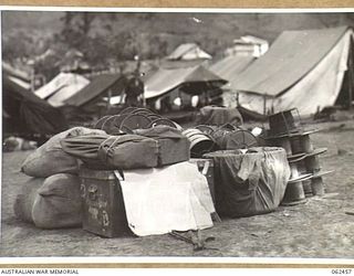 PORT MORESBY, PAPUA, NEW GUINEA. 1944-01-05. STORES AND EQUIPMENT OF THE 58/59TH AUSTRALIAN INFANTRY BATTALION, 15TH AUSTRALIAN INFANTRY BRIGADE, PACKED AND READY FOR TRANSPORT TO DUMPU, NEW GUINEA