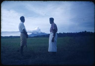 Senior Medical Orderly Timeaus of Gona village and Albert Maori Kiki looking at Mt. Lamington, Popondetta, Papua New Guinea, 1951 / Albert Speer