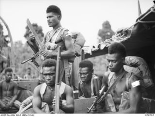 JACQUINOT BAY, NEW BRITAIN. 1944-11-06. MEMBERS OF B COMPANY, 1ST NEW GUINEA INFANTRY BATTALION ABOARD THE FORMER HAWKESBURY RIVER (NEW SOUTH WALES) VEHICULAR FERRY, THE FRANCES PEAT, WHICH IS TO ..