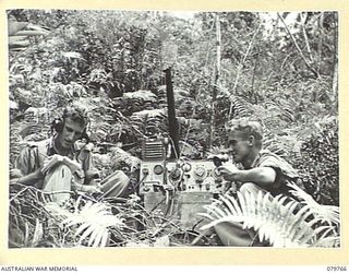 AITAPE, NEW GUINEA. 1945-03-16. A "22" TRANSCEIVER (AUSTRALIAN) WIRELESS SET OPERATED BY MEMBERS FROM HEADQUARTERS 6TH DIVISION SIGNALS