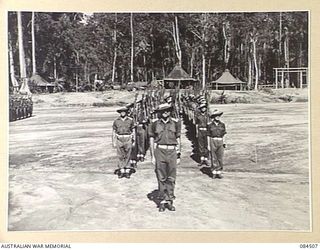 BOUGAINVILLE, SOLOMON ISLANDS, 1944-12-21. A COMPANY, 42 INFANTRY BATTALION MARCHING FROM THE PARADE GROUND AFTER THE GENERAL SALUTE HAD BEEN TAKEN BY MAJOR-GENERAL W. BRIDGEFORD, GENERAL OFFICER ..