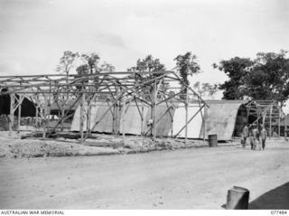 TOROKINA, BOUGAINVILLE ISLAND. 1944-12-04. NO. 2 SUB DEPOT, 16TH ADVANCED ORDNANCE DEPOT IN COURSE OF CONSTRUCTION. IDENTIFIED PERSONNEL ARE:- QX58212 CORPORAL R.J. CUMMING (1); NX102101 WARRANT ..