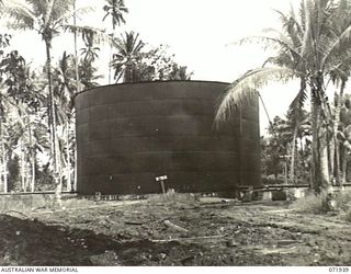 MILNE BAY, PAPUA, NEW GUINEA. 1944-04-03. TANK B A 5,000,000 GALLON STORAGE TANK OF WELDED CONSTRUCTION, ONE OF SEVERAL TANKS IN USE AT THE 2ND BULK PETROLEUM STORAGE COMPANY