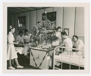 [Nurses and Wounded Soldiers Trim a Christmas Tree]
