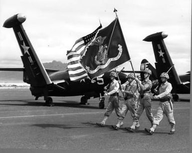 Marine Color Guard marching on the tarmac at Marine Corps Air Station, Kaneohe Bay, Hawaii