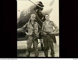 TOROKINA, BOUGAINVILLE ISLAND, SOLOMON ISLANDS. 1945-08-17. WIRRAWAY CREW OF NO. 5 (TACTICAL RECONNAISSANCE) SQUADRON RAAF RETURNING FROM DROPPING LIEUTENANT GENERAL S. G. SAVIGE'S SURRENDER ORDERS ..