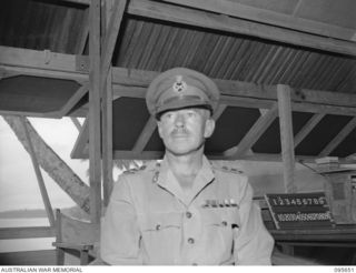 PALMALMAL, JACQUINOT BAY, NEW BRITAIN. 1945-09-01. MAJOR GENERAL K.W. EATHER, GENERAL OFFICER COMMANDING 11 DIVISION, AT HEADQUARTERS 11 DIVISION