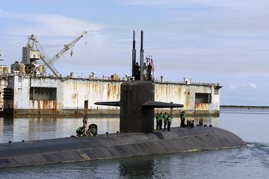 The US Navy (USN) Los Angeles Class Attack Submarine USS SAN FRANCISCO (SSN 711) departs its former homeport of Apra Harbor, Guam, to make the journey across the Pacific Ocean to her new homeport of Bremerton, Washington (WA). The SAN FRANCISCO was part of Submarine Squadron 15 operating from the Mariana Islands