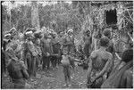 Bride price ritual: decorated men at exchange