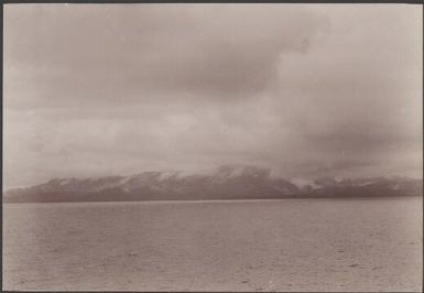 Rain over the coast of Vella Lavella Island, Solomon Islands, 1906 / J.W. Beattie