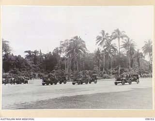 TOROKINA, BOUGAINVILLE. 1945-10-22. A CEREMONIAL PARADE AND MARCH PAST BY 29 INFANTRY BRIGADE WAS HELD FOR MAJOR GENERAL W. BRIDGEFORD, GENERAL OFFICER COMMANDING 3 DIVISION, AT TOROKINA AIRFIELD. ..