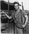 Marine Poses by Jeep in Guam