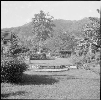 Curved steps beside Chinnery's house with North Daughter in the distance, Malaguna Road, Rabaul, New Guinea, ca. 1936, 1 / Sarah Chinnery