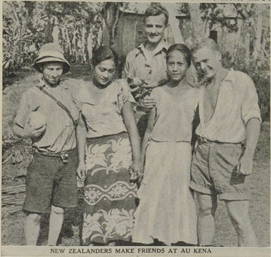 Three men from the Cap Pilar posing with two Gambier Island women during the visit to Au Kena