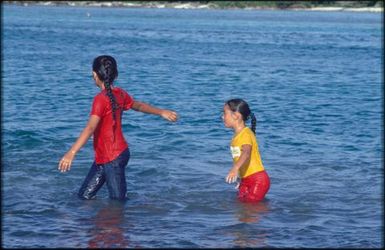 Group of children playing in water