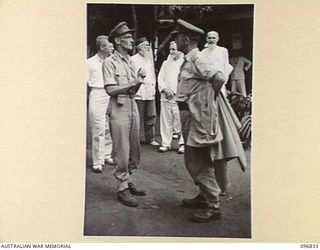 RAMALE MISSION, KOKOPO AREA, NEW BRITAIN. 1945-09-16. RED CROSS REPRESENTATIVES WHO TOOK SUPPLIES TO THE 158 WHITE INTERNEES WHO WERE LIBERATED WHEN TROOPS OF HQ 11 DIVISION OCCUPIED THE AREA ..