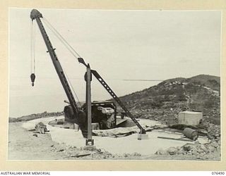 PORT MORESBY, PAPUA. 1944-10-18. NO.1 GUN OF THE BASILISK BATTERY OF THE 801ST ANTI-AIRCRAFT AND COAST ARTILLERY BATTERY, ALMOST FULLY ASSEMBLED