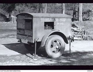 RABAUL, NEW BRITAIN, 1946-03-30. THE POWER PLANT TRAILER WHICH SUPPLIES POWER FOR THE FILM PROJECTORS USED BY UNIT NO 149, MOBILE CINEMA HQ, AUSTRALIAN ARMY AMENITIES SERVICE