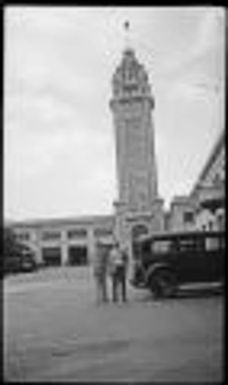 Bob Musselman and another man in front of Aloha Tower