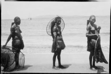 Three women with fishing baskets, Awar, Sepik River, New Guinea, 1935 / Sarah Chinnery