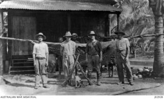 MEMBERS OF CAPTAIN HUNT'S SURVEYING PARTY AT TOIEMONAPU, BOUGAINVILLE, NEW GUINEA, 1917-03. (DONATED BY MR. F.O. CUTLER.)