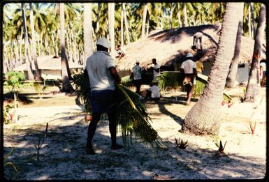 Thatching a bure in Fiji, 1971