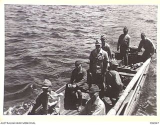 BOUGAINVILLE, 1945-09-17. THE SURRENDER COMMISSIONER AND PARTY FROM HEADQUARTERS 2 CORPS ARRIVED IN NUMA NUMA HARBOUR TO TAKE OVER FROM THE JAPANESE AFTER THE SURRENDER. SHOWN JAPANESE COMMANDER ..