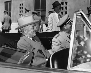 President Harry S. Truman and Admiral Arthur Radford in Backseat of Car