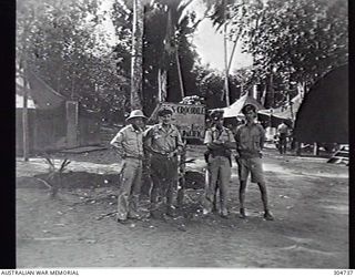 BRITISH SOLOMON ISLANDS PROTECTORATE. 1943-06-28. AUSTRALIAN MEMBERS OF THE AMPHIBIOUS FORCE PRIOR TO EMBARKING WITH TASK FORCE 31. LEFT TO RIGHT: W. RAWSON, CIVILIAN PILOT OF USS MCCAWLEY; WARRANT ..