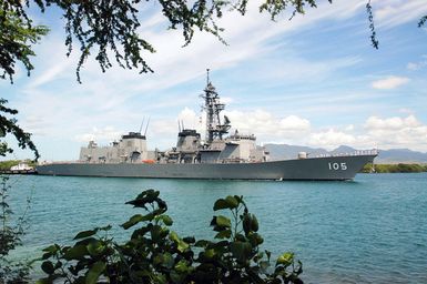 The Japanese Maritime Self-Defense Force (MSDF) Murasame Class Destroyer Japanese Defense Ship (JDS) Inazuma (DD 105) passes Hospital Point in Pearl Harbor, Hawaii, during arrival honors prior to the multinational maritime exercise Rim of the Pacific 2004 (RIMPAC). RIMPAC is the largest international maritime exercise in the waters around the Hawaiian Islands. This years exercise will include eight participating nations; Australia, Canada, Chile, Japan, Peru, South Korea, Britain and the United States. RIMPAC is intended to enhance the tactical proficiency of participating units in a wide array of combined operations at sea, while enhancing stability in the Pacific Rim region