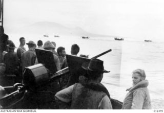 Cape Gloucester, New Britain. 1943-12-26. Part of the landing force of United States Marines heading for the shore following a heavy naval bombardment by United States and RAN ships