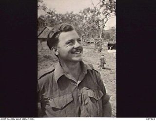NEW GUINEA. 1943-07-25. SERGEANT C. BUSH, AUSTRALIAN WAR ARTIST, HEADQUARTERS, NEW GUINEA FORCE