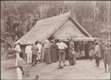 Passengers and crew of the Southern Cross with villagers at Buala, Solomon Islands, 1906 / J.W. Beattie