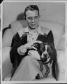 Alfred A. Schlegel Relaxes with His Dog