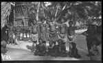 Young people near a house, probably at Chiria, Yule Island