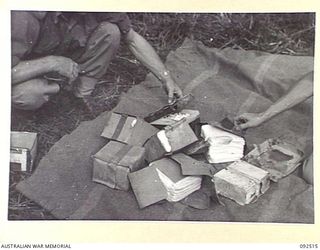 LAE AREA, NEW GUINEA. 1945-05-25. DENTAL STORES AT 54 DENTAL UNIT WHICH HAVE BEEN DAMAGED BY WEATHER CONDITIONS. THE PICTURE WAS TAKEN AT THE REQUEST OF DR. WARNER, SCIENTIFIC LIAISON SECTION ..