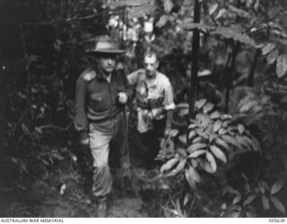 GOODVIEW, NEW GUINEA. 1943-08-10. SENIOR OFFICERS ON THE TRACK TO DRAKES OBSERVATION POST. THEY ARE:- SX2889 BRIGADIER M. J. MOTEN CBE DSO ED, COMMANDING, 17TH AUSTRALIAN INFANTRY BRIGADE (LEFT); ..