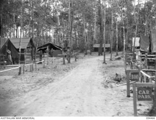 SOUTH BOUGAINVILLE. 1945-07-29. THE CAMP AREA, HEADQUARTERS 29 INFANTRY BRIGADE, ON THE BUIN ROAD, EAST OF THE OGORATA RIVER. THROUGH HEAVY RAIN SECTIONS OF THE BUIN ROAD HAVE BECOME IMPASSABLE TO ..