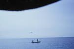 Fishing, using a kite attached to line, Bougainville, Jun 1963