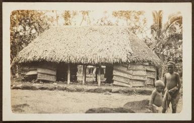 Two boys in front of a fale. From the album: Samoa