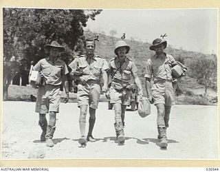 PAPUA, NEW GUINEA. 1942-09-07. RAAF PILOTS WHO FOUGHT JAPANESE ZERO FIGHTER PLANES AND STRAFED LANDING PARTIES AT MILNE BAY. LEFT TO RIGHT:- PILOT- OFFICER R. G. RIDDELL, FLIGHT-LIEUTENANT J. W. ..