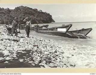 FINSCHHAFEN AREA. NEW GUINEA. 3 NOVEMBER 1943. 37 DEAD JAPANESE WERE COUNTED IN THESE TWO WRECKED BARGES AT SCARLET BEACH. (NEGATIVE BY N. BROWN)