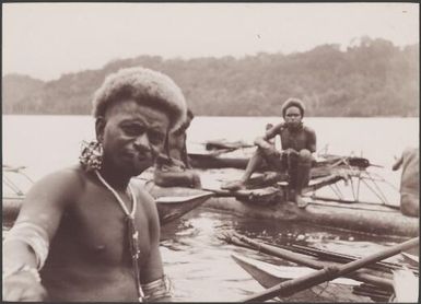 Santa Cruz men in canoes, Graciosa Bay, Solomon Islands, 1906 / J.W. Beattie