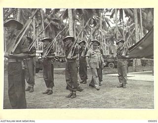 AITAPE, NEW GUINEA. 1945-03-19. GENERAL SIR THOMAS A. BLAMEY, COMMANDER-IN-CHIEF, ALLIED LAND FORCES, SOUTH WEST PACIFIC AREA (5), INSPECTING THE GUARD OF HONOUR AT 2/8 INFANTRY BATTALION, DURING ..